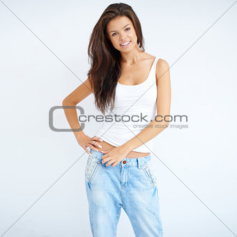 Natural brunette woman in jeans