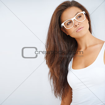 Portrait of brunette girl wearing glasses