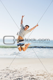 Energetic handsome man jumping