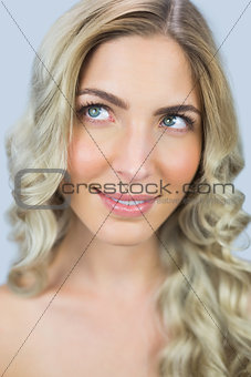 Pensive natural blonde posing