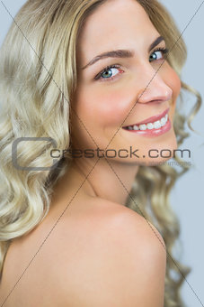 Cheerful gorgeous blond model posing