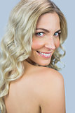 Smiling gorgeous blond model posing