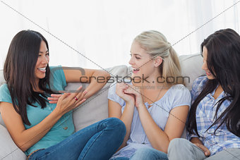 Friends laughing and chatting together