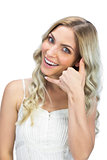 Attractive blue eyed model making call gesture