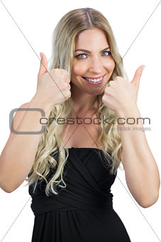 Gorgeous blonde in black dress thumbs up