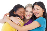 Diverse young women hugging each other