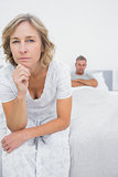 Annoyed woman looking at camera after fight with husband