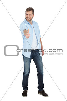 Confident model smiling and giving thumbs up