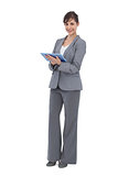 Smiling businesswoman with tablet computer