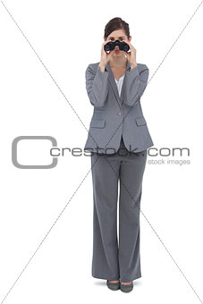 Young woman posing with binoculars