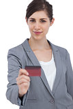 Businesswoman holding credit card