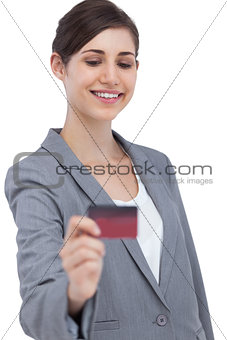 Smiling businesswoman with credit card