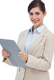 Cheerful businesswoman with clipboard