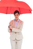 Young businesswoman with umbrella