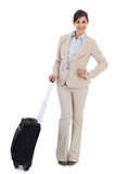 Happy businesswoman with suitcase