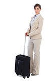 Businesswoman posing with suitcase
