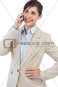 Cheerful businesswoman on the phone