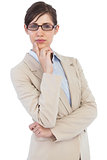 Thoughtful businesswoman wearing glasses
