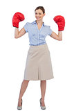 Buisnesswoman posing with boxing gloves