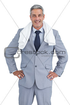 Sporty businessman with towel