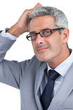 Doubtful handsome businessman wearing glasses