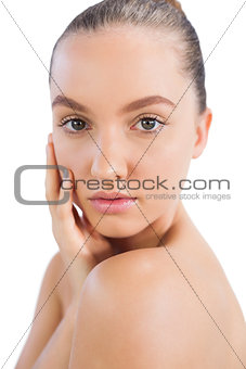 Young model touching her face