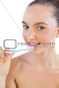 Young model with toothbrush