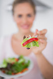 Woman with salad dish