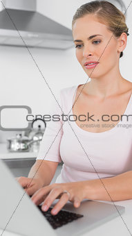 Serious woman with laptop