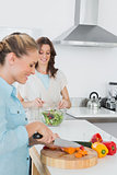 Cheerful women cooking together
