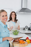 Relaxed women cooking together