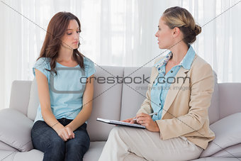 Woman listening to her psychologist