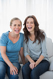 Women bursting out laughing