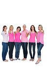 Positive women posing with pink top for breast cancer