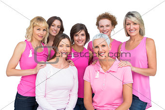 Beautiful women posing and wearing pink for breast cancer
