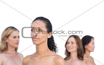Pensive nude models posing looking away