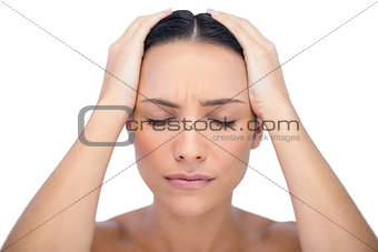 Young woman having strong headache