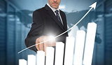 Businessman touching bar chart interface with world map on background