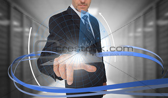 Businessman touching graph on futuristic interface with swirling lines