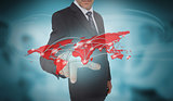 Businessman selecting futuristic red world map interface