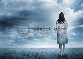 Businesswoman looking out to horizon