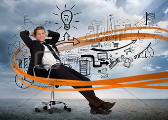 Businessman sitting in front of detailed brainstorm