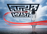 Businesswoman standing looking at red arrow through qr code
