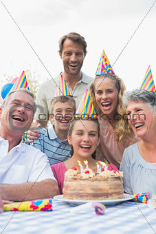 Happy extended family celebrating a birthday