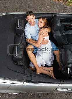 Couple relaxing in the back seat