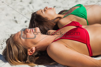 Relaxed young women taking sun