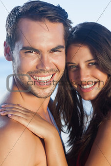 Cheerful loving couple posing together