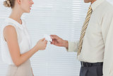 Business people exchanging business card