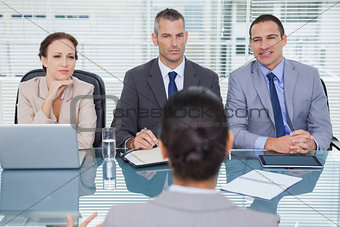 Business team listening to the applicant in interview