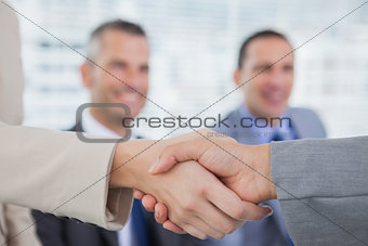 Future workmates shaking hands